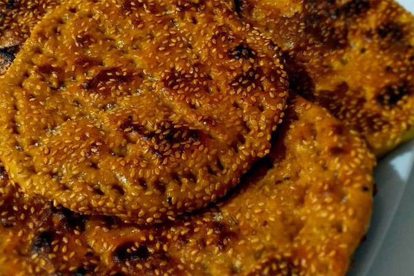 مقایسه سوغات کرمان و بوشهر 7 نان گرده سوغات بوشهر